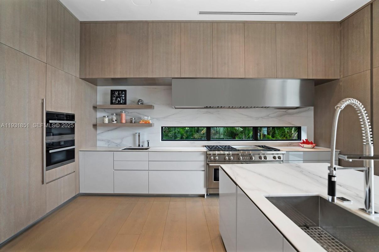 Interior, Kitchen, Marble Walls, Stainless Steel Appliances, Wood Texture Flooring