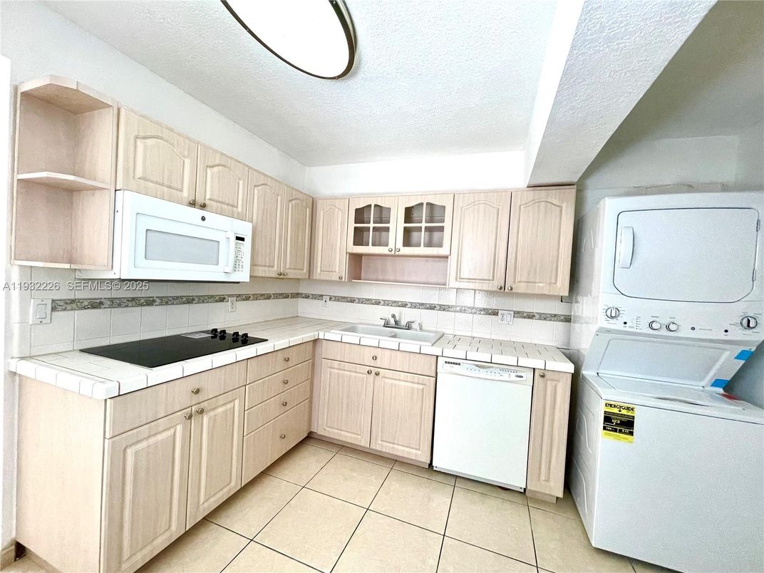 Interior, Kitchen, Tile Countertops, Washer