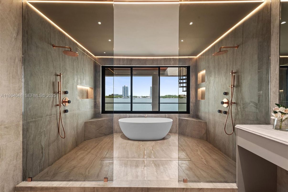 Bathroom, Free Standing Baths, Glass Shower, Interior, Marble, Marble Walls, Recessed Lighting, Water