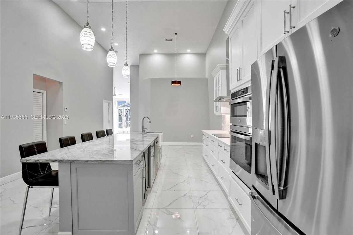 Interior, Kitchen, Marble, Pendant Lights, Recessed Lighting, Stainless Steel Appliances