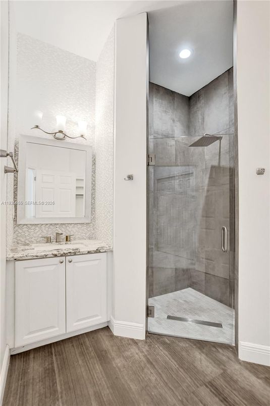 Bathroom, Glass Shower, Interior, Recessed Lighting, Wood Texture Flooring