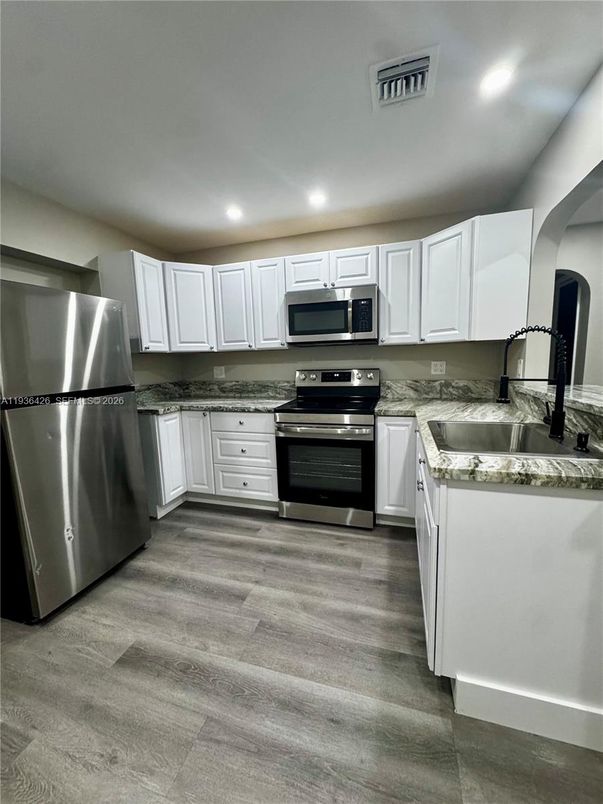 Interior, Kitchen, Recessed Lighting, Stainless Steel Appliances, Wood Texture Flooring