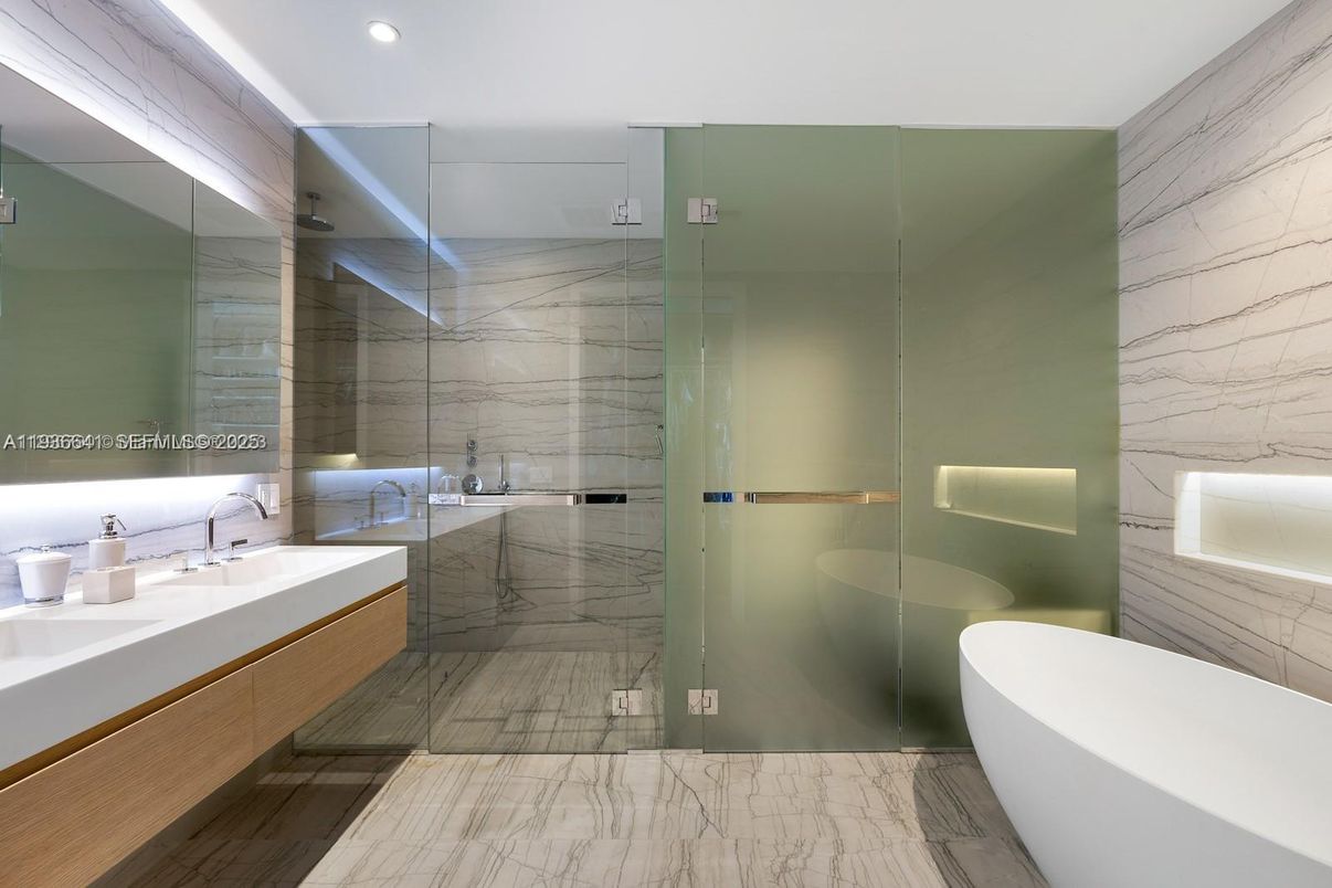 Bathroom, Free Standing Baths, Glass Shower, Interior, Marble, Marble Walls, Recessed Lighting