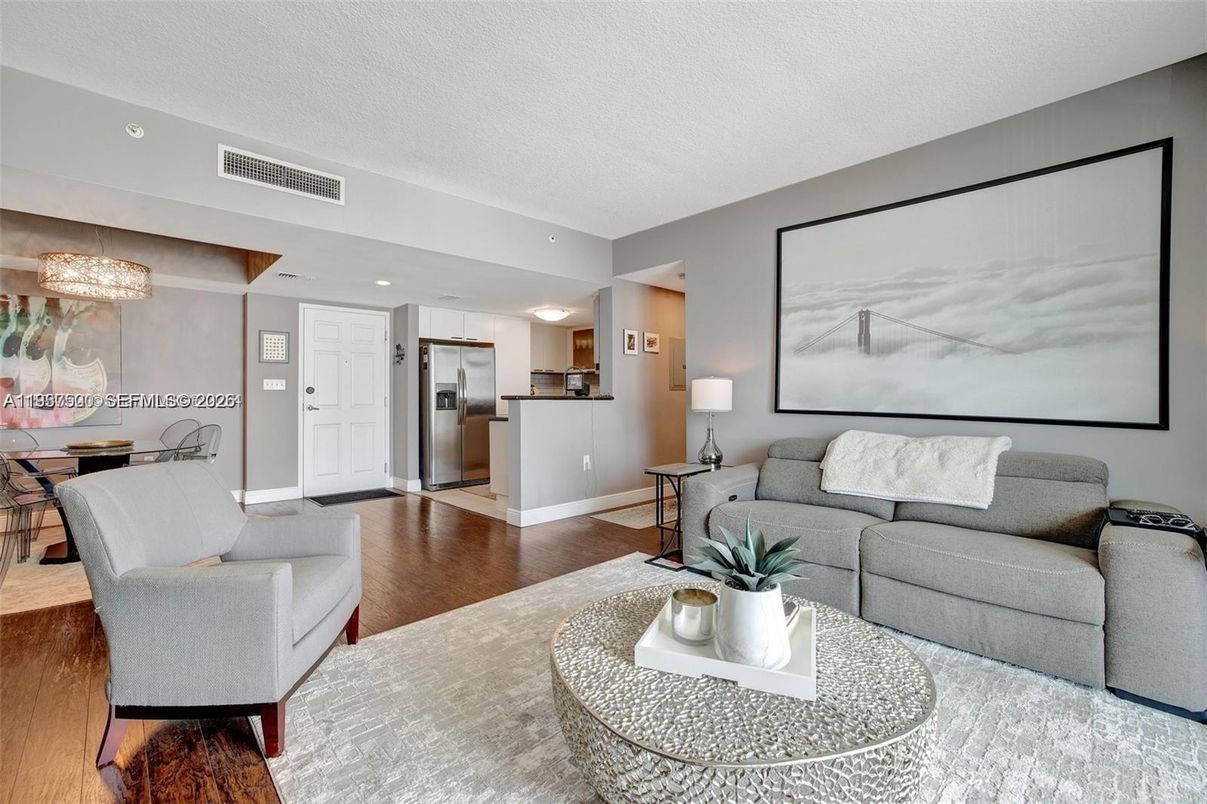 Chandelier, Dining room, Interior, Kitchen, Living room, Projection Screen, Recessed Lighting, Wood Texture Flooring