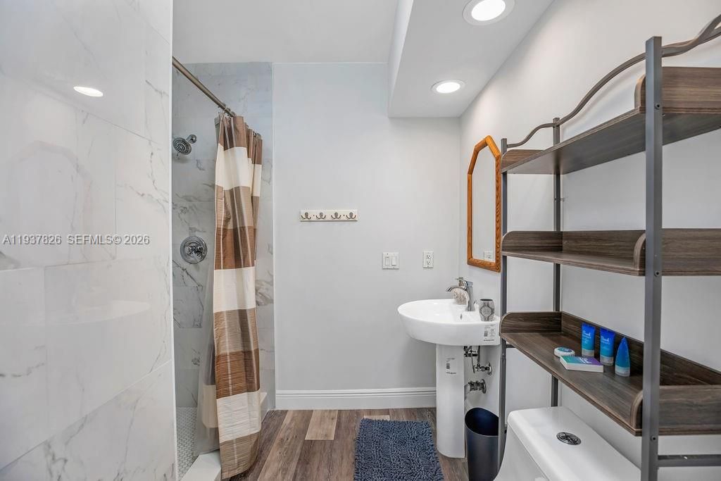 Bathroom, Interior, Marble Walls, Recessed Lighting, Wood Texture Flooring