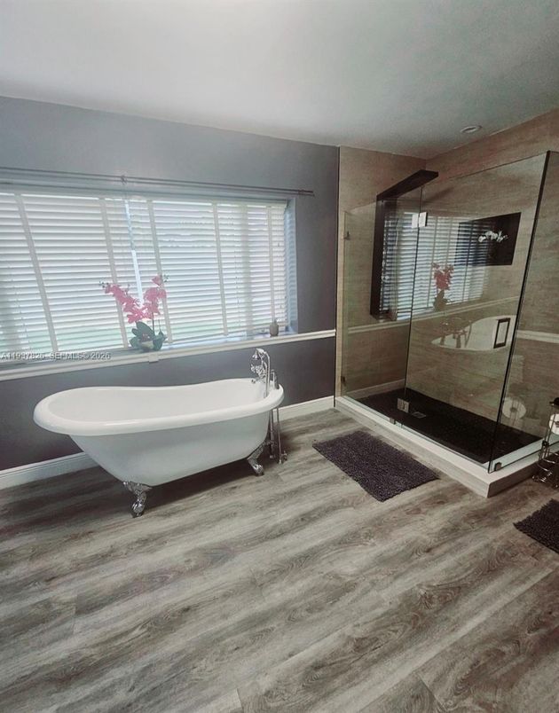 Bathroom, Free Standing Baths, Glass Shower, Interior, Wood Texture Flooring