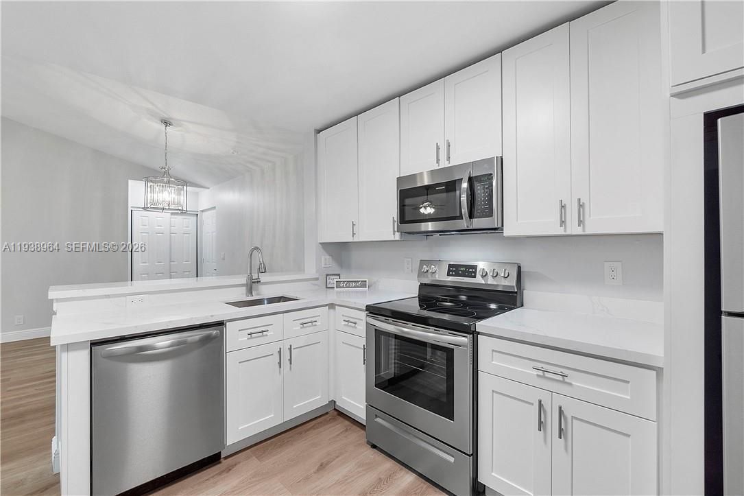 Chandelier, Interior, Kitchen, Pendant Lights, Stainless Steel Appliances, Wood Texture Flooring