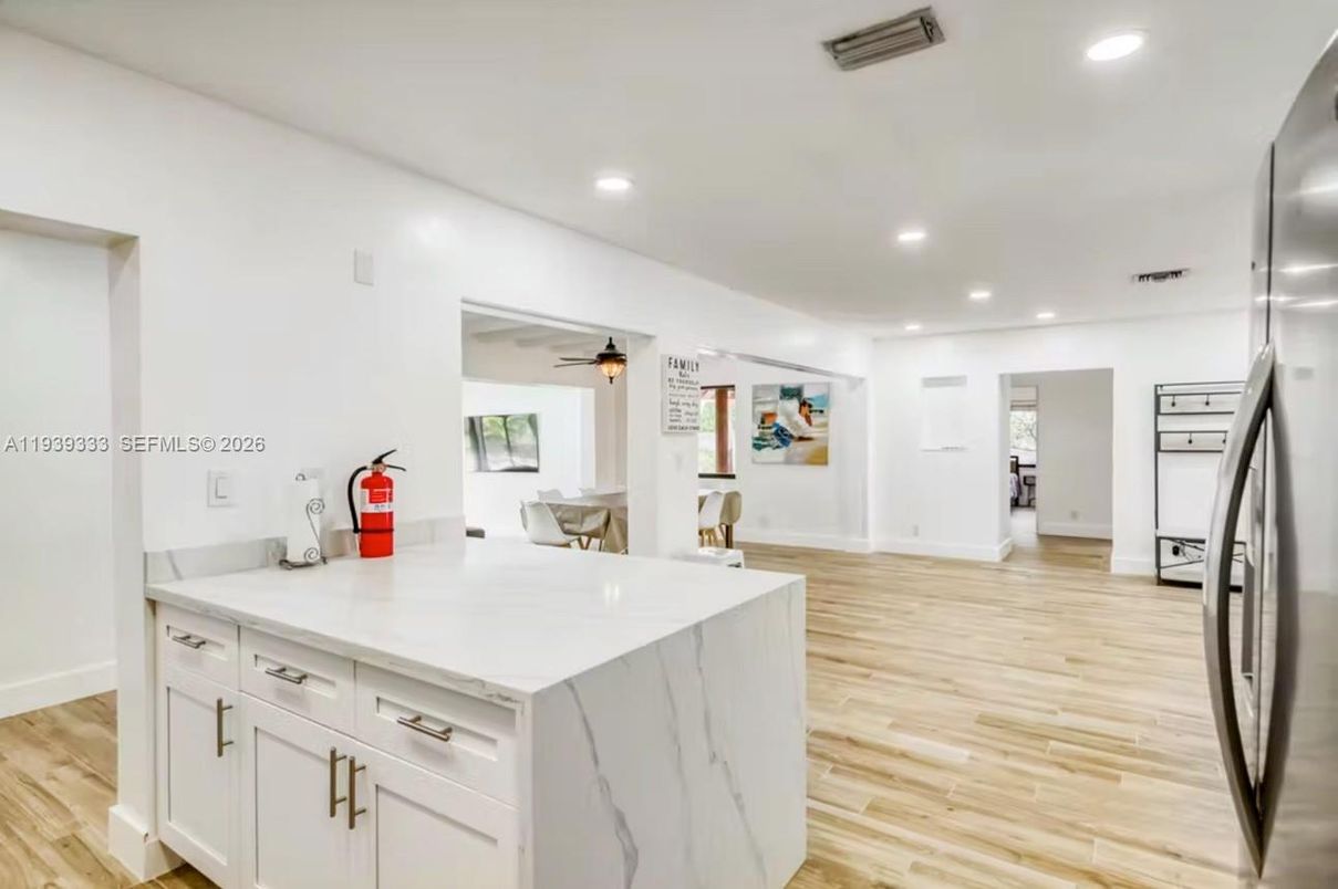Dining room, Interior, Kitchen, Recessed Lighting, Stainless Steel Appliances, Wood Texture Flooring