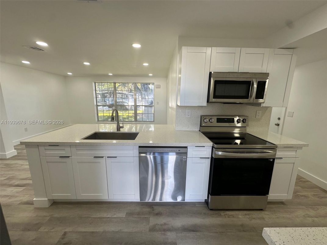 Interior, Kitchen, Recessed Lighting, Stainless Steel Appliances, Wood Texture Flooring