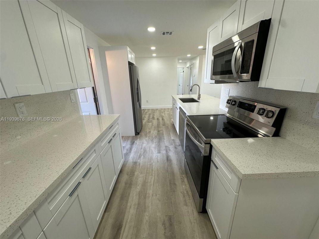 Interior, Kitchen, Recessed Lighting, Stainless Steel Appliances, Wood Texture Flooring