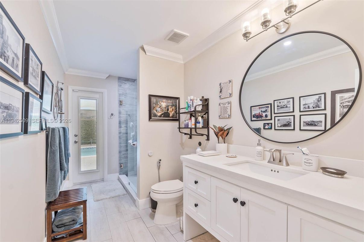 Bathroom, Dual Sink Vanities, Glass Shower, Interior, Wood Texture Flooring