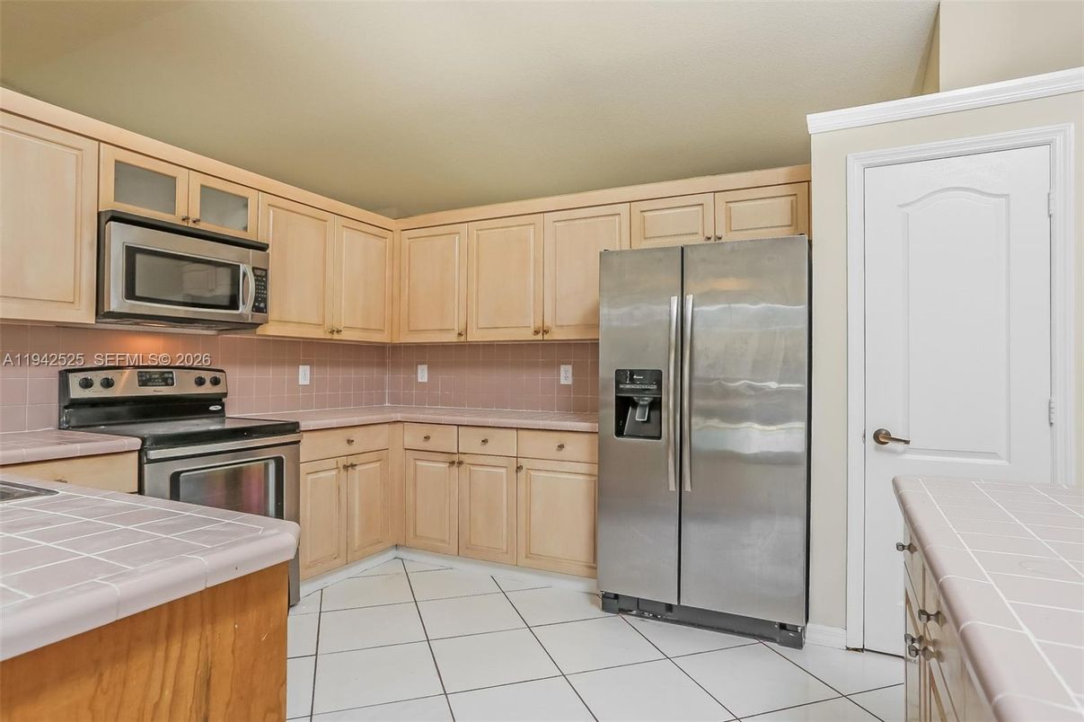 Interior, Kitchen, Stainless Steel Appliances, Tile Countertops