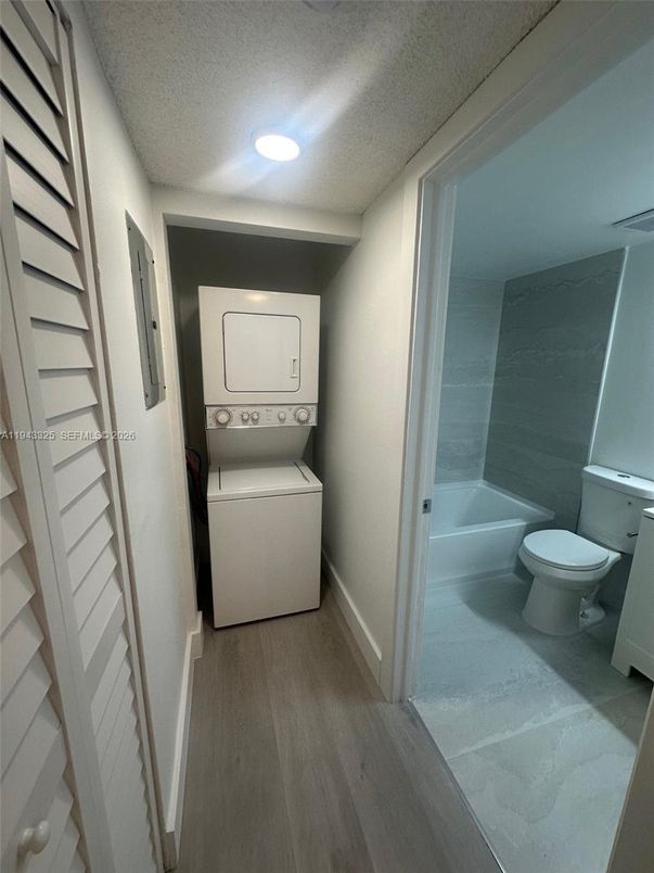 Bathroom, Interior, Recessed Lighting, Utility Closets, Washer, Wood Texture Flooring