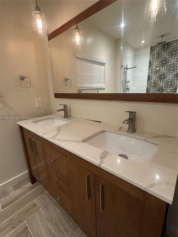 Bathroom, Dual Sink Vanities, Interior, Recessed Lighting, Wood Texture Flooring