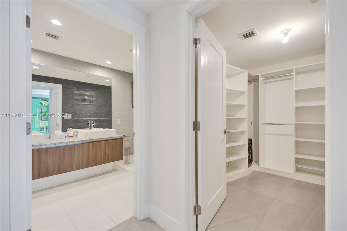 Bathroom, Dual Sink Vanities, Interior, Recessed Lighting, Walk-in Closets