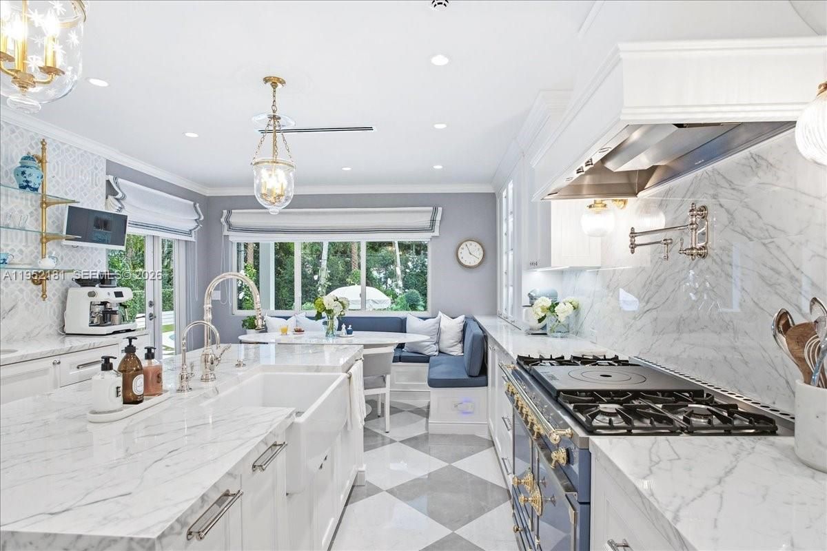 Interior, Kitchen, Marble Walls, Pendant Lights, Recessed Lighting, Stainless Steel Appliances