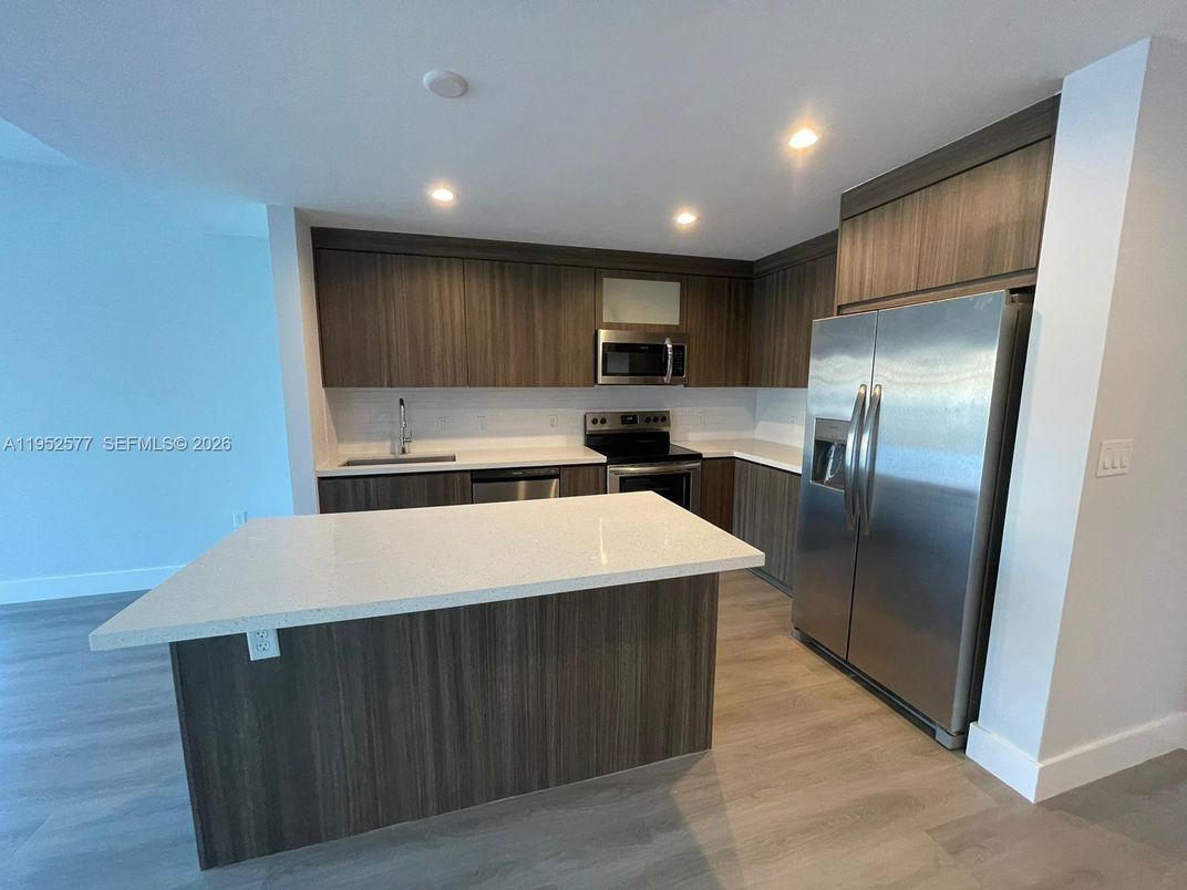 Interior, Kitchen, Recessed Lighting, Stainless Steel Appliances, Wood Texture Flooring