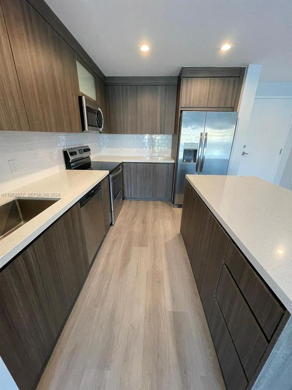 Interior, Kitchen, Recessed Lighting, Stainless Steel Appliances, Wood Texture Flooring