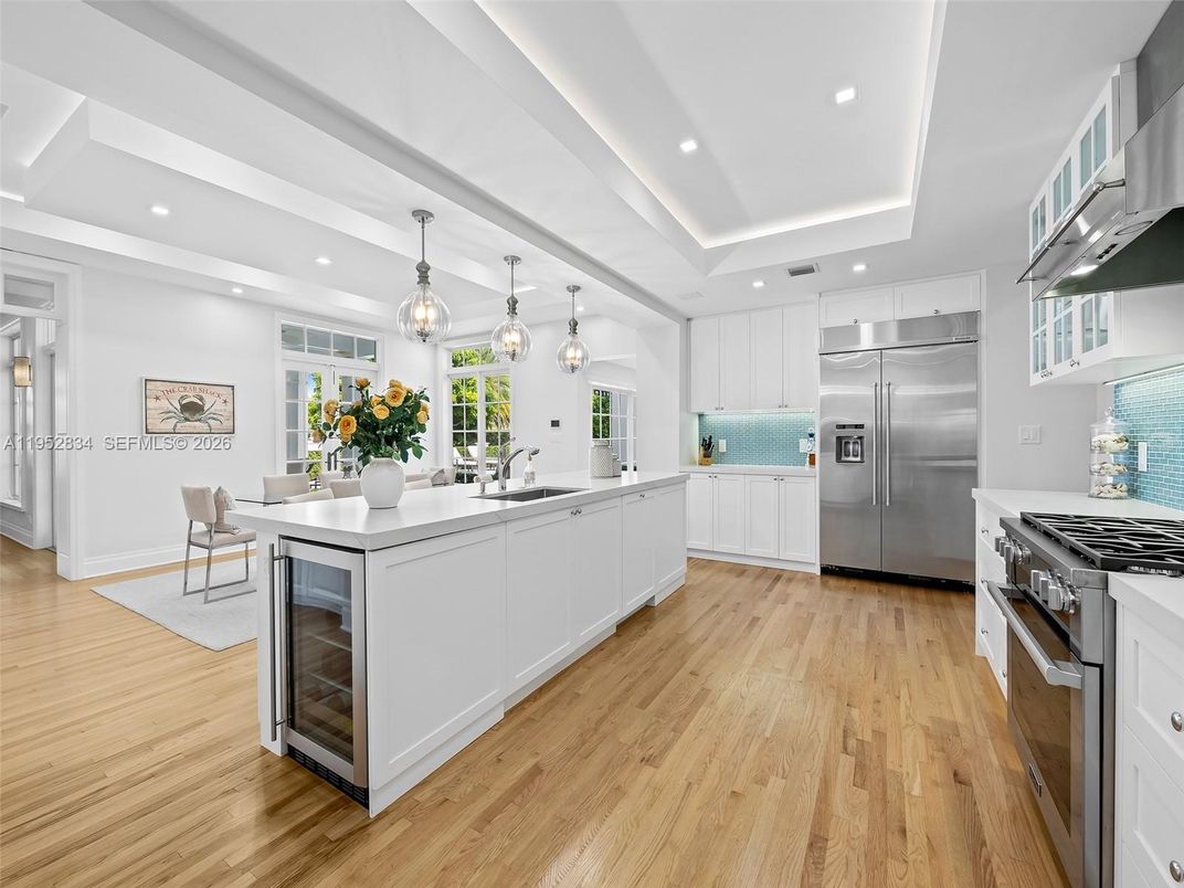 Dining room, Interior, Kitchen, Pendant Lights, Recessed Lighting, Stainless Steel Appliances, Wood Texture Flooring