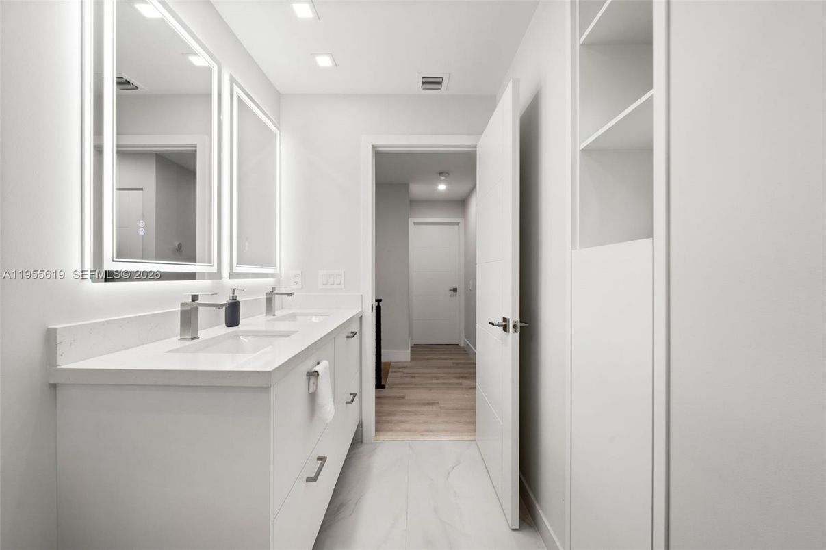 Bathroom, Dual Sink Vanities, Interior, Marble, Recessed Lighting, Wood Texture Flooring