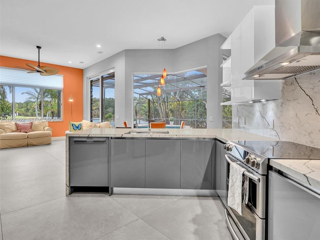 Interior, Kitchen, Living room, Marble Walls, Pendant Lights, Recessed Lighting, Stainless Steel Appliances