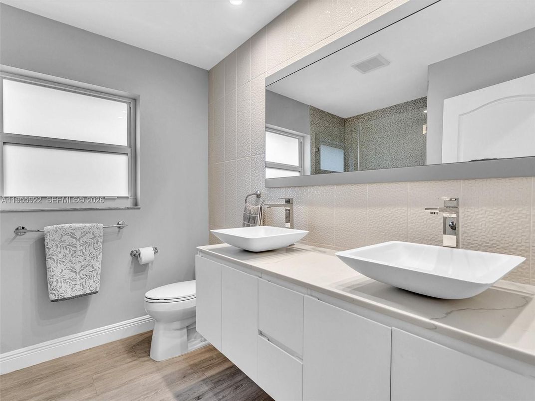 Bathroom, Dual Sink Vanities, Interior, Recessed Lighting, Wood Texture Flooring