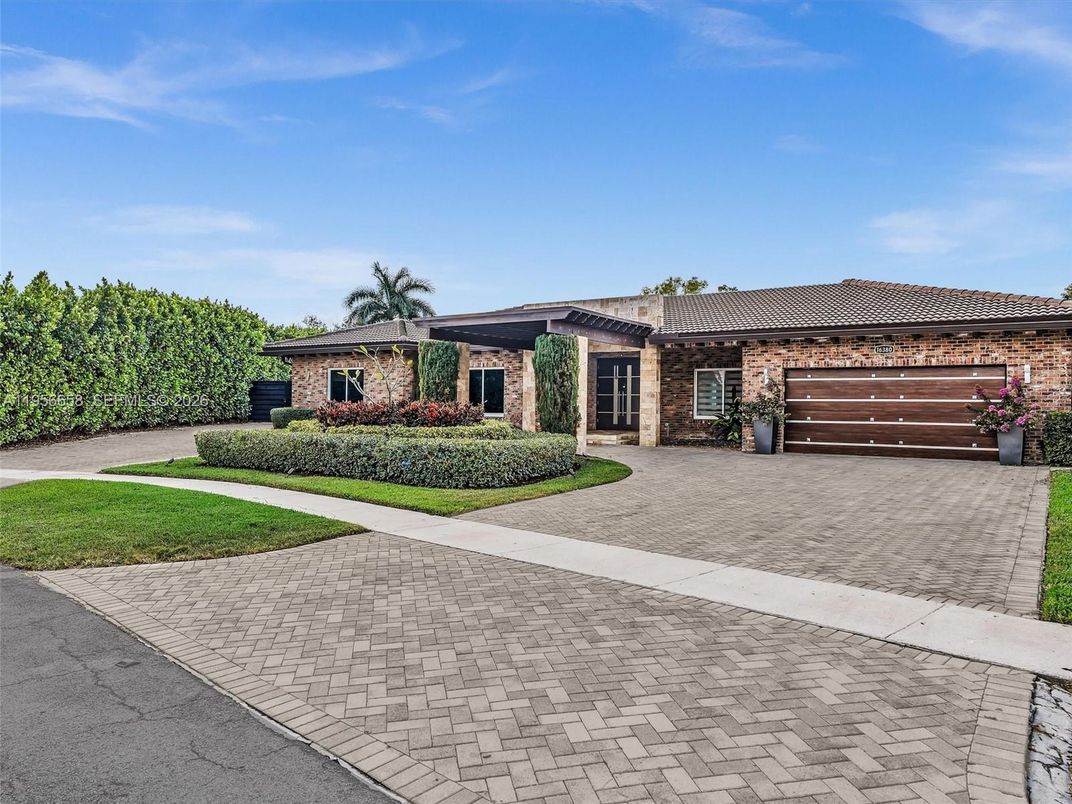 Attached, Backyard, Exterior, Facade, Brick Facade, Mediterranean