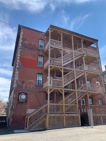 Exterior, Facade, Brick Facade, Condo Building