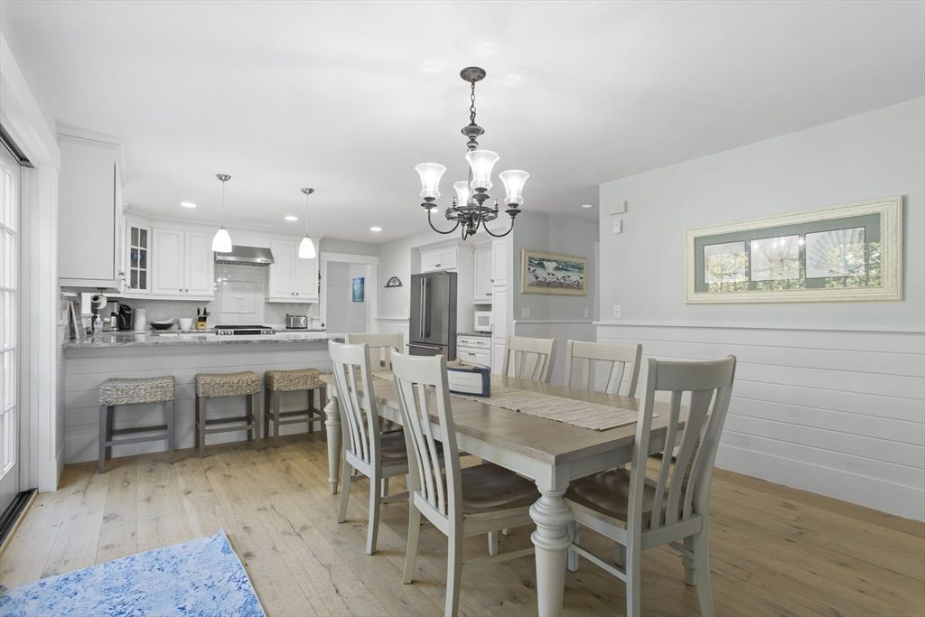 Chandelier, Dining room, Interior, Kitchen, Pendant Lights, Recessed Lighting, Stainless Steel Appliances, Wood Texture Flooring