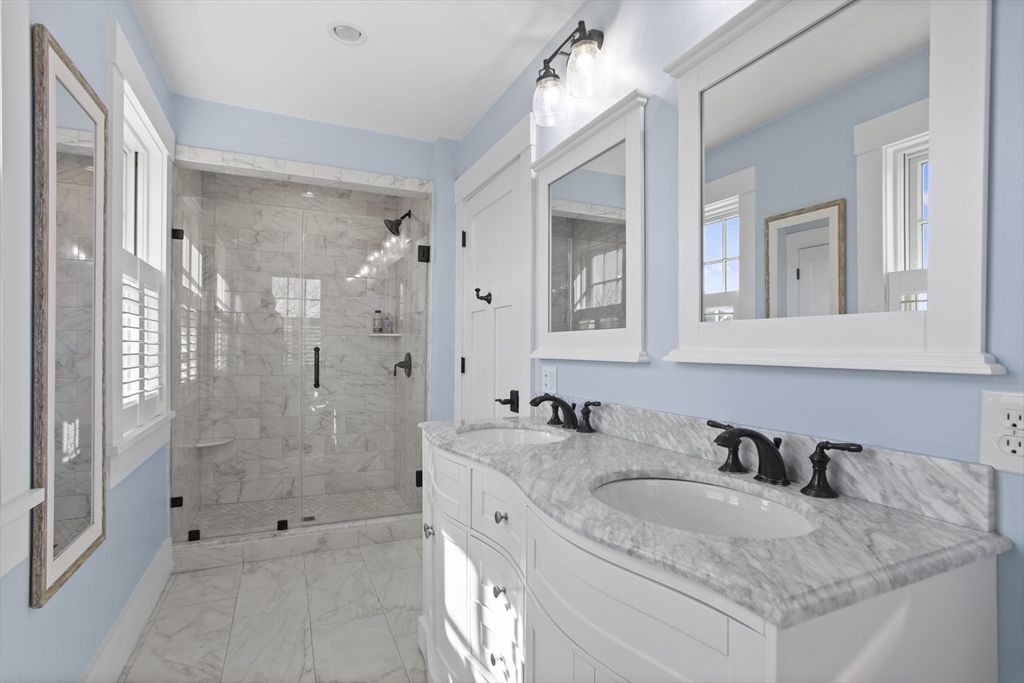 Bathroom, Dual Sink Vanities, Glass Shower, Interior, Marble, Marble Walls, Recessed Lighting