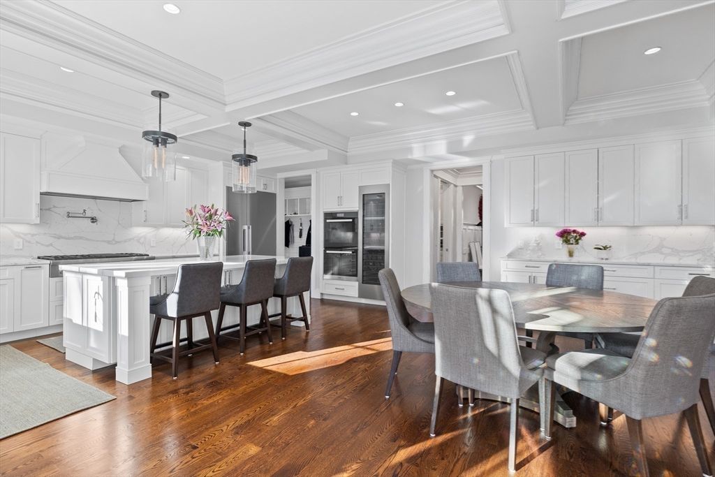Dining room, Interior, Kitchen, Marble Walls, Pendant Lights, Recessed Lighting, Stainless Steel Appliances, Wood Texture Flooring