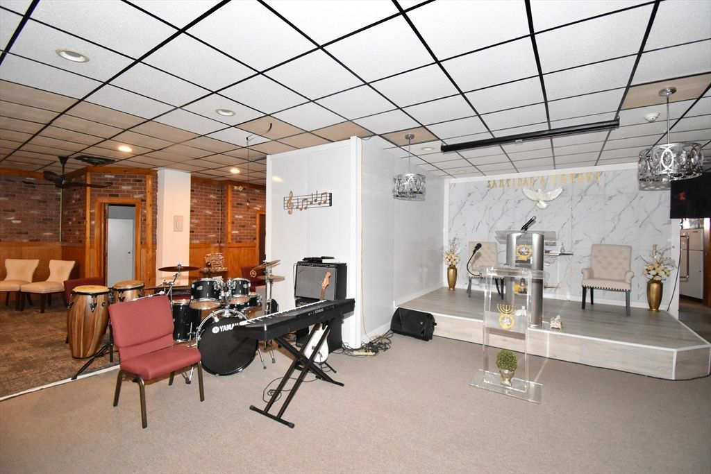 Dining room, Fireplace, Interior, Marble Walls, Recessed Lighting, Stone Walls