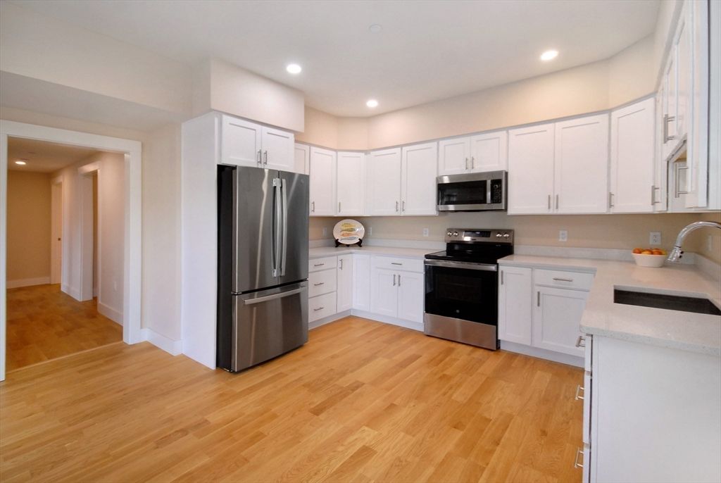 Interior, Kitchen, Recessed Lighting, Stainless Steel Appliances, Wood Texture Flooring