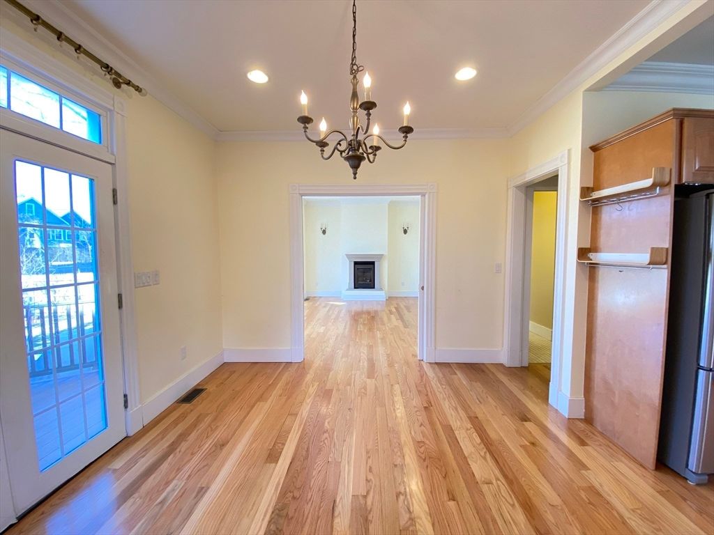 Chandelier, Empty room, Fireplace, Interior, Recessed Lighting, Wood Texture Flooring