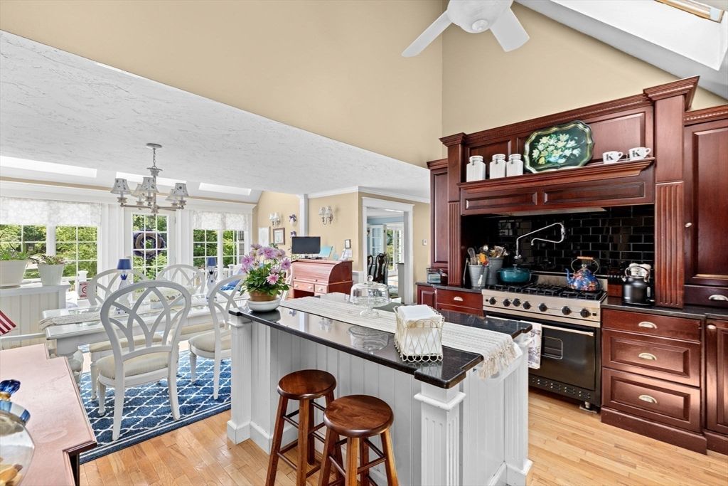 Chandelier, Dining room, Interior, Kitchen, Stainless Steel Appliances, Wood Texture Flooring