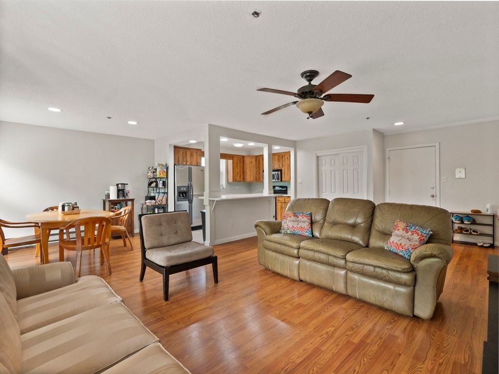 Dining room, Interior, Kitchen, Living room, Recessed Lighting, Stainless Steel Appliances, Wood Texture Flooring