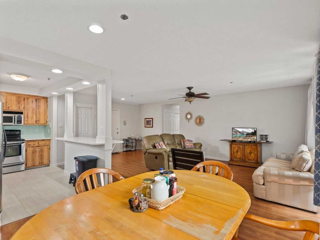 Dining room, Interior, Kitchen, Living room, Recessed Lighting, Stainless Steel Appliances, Wood Texture Flooring