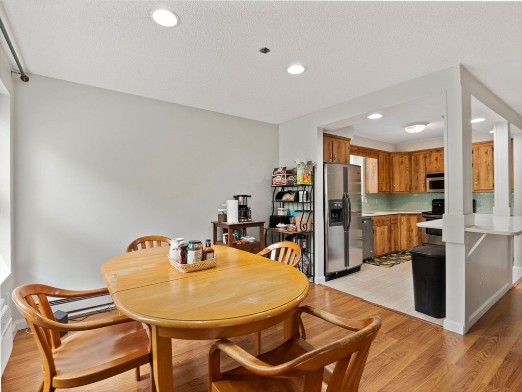 Dining room, Interior, Kitchen, Recessed Lighting, Stainless Steel Appliances, Wood Texture Flooring
