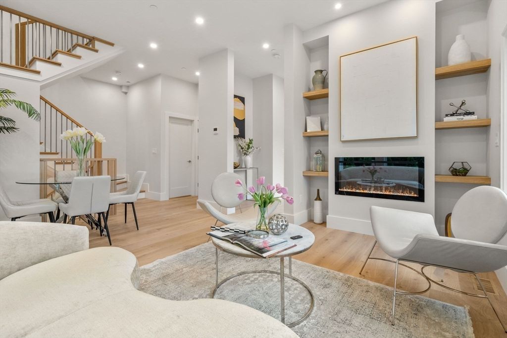 Dining room, Fireplace, Interior, Living room, Recessed Lighting, Wood Texture Flooring
