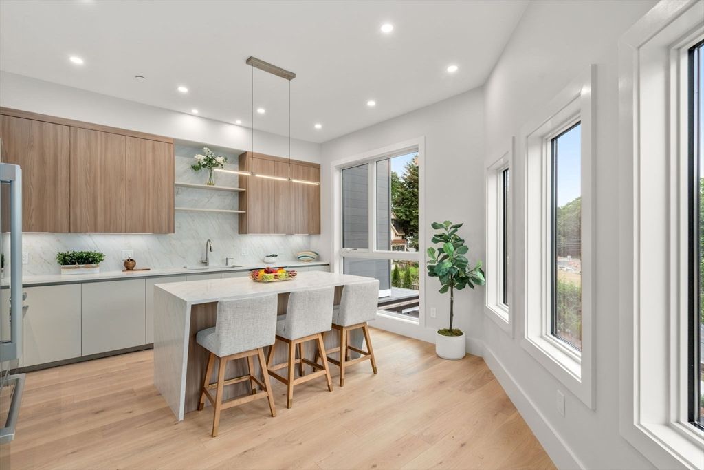 Interior, Kitchen, Marble Walls, Pendant Lights, Recessed Lighting, Stainless Steel Appliances, Wood Texture Flooring