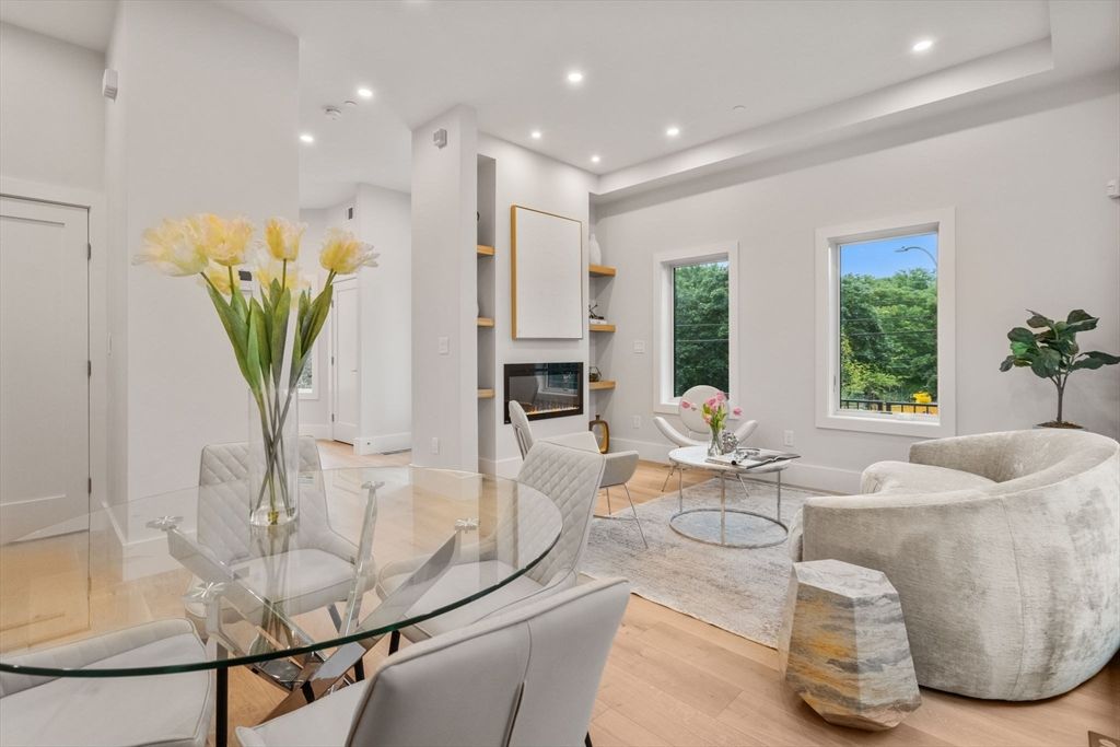 Dining room, Fireplace, Interior, Living room, Recessed Lighting, Wood Texture Flooring