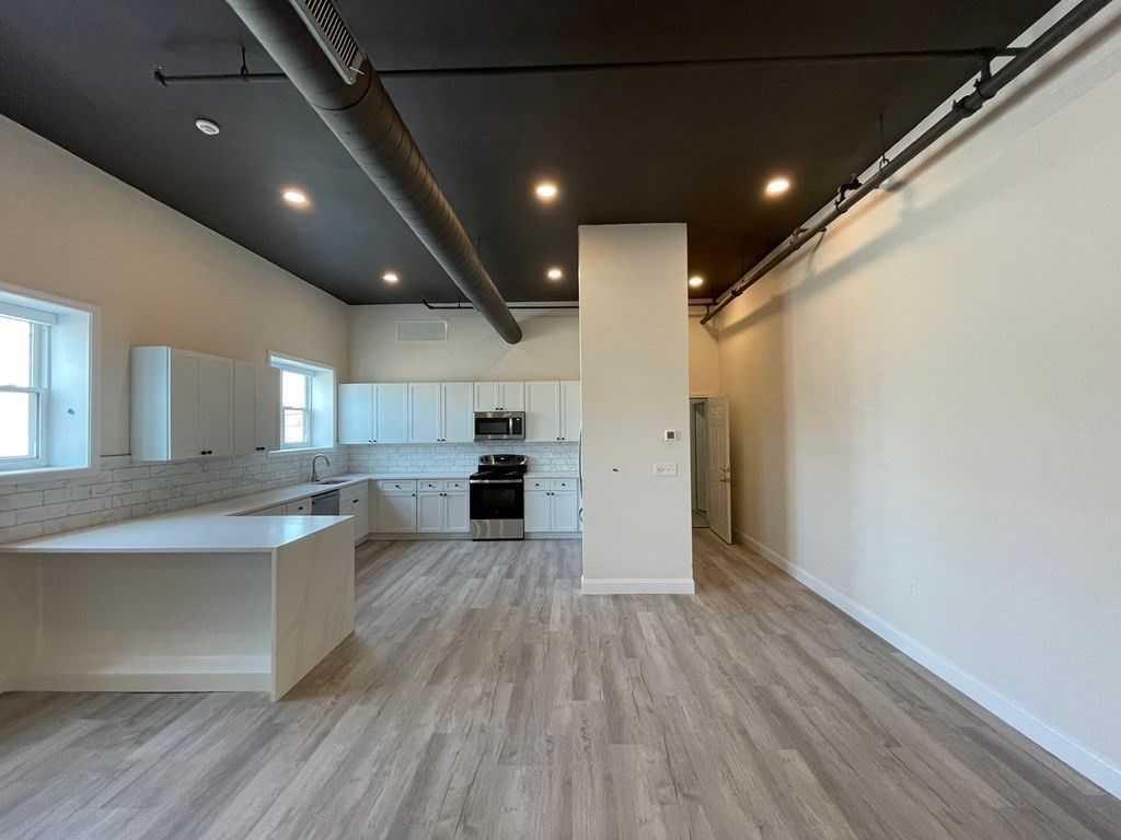 Interior, Kitchen, Recessed Lighting, Stainless Steel Appliances, Wood Texture Flooring