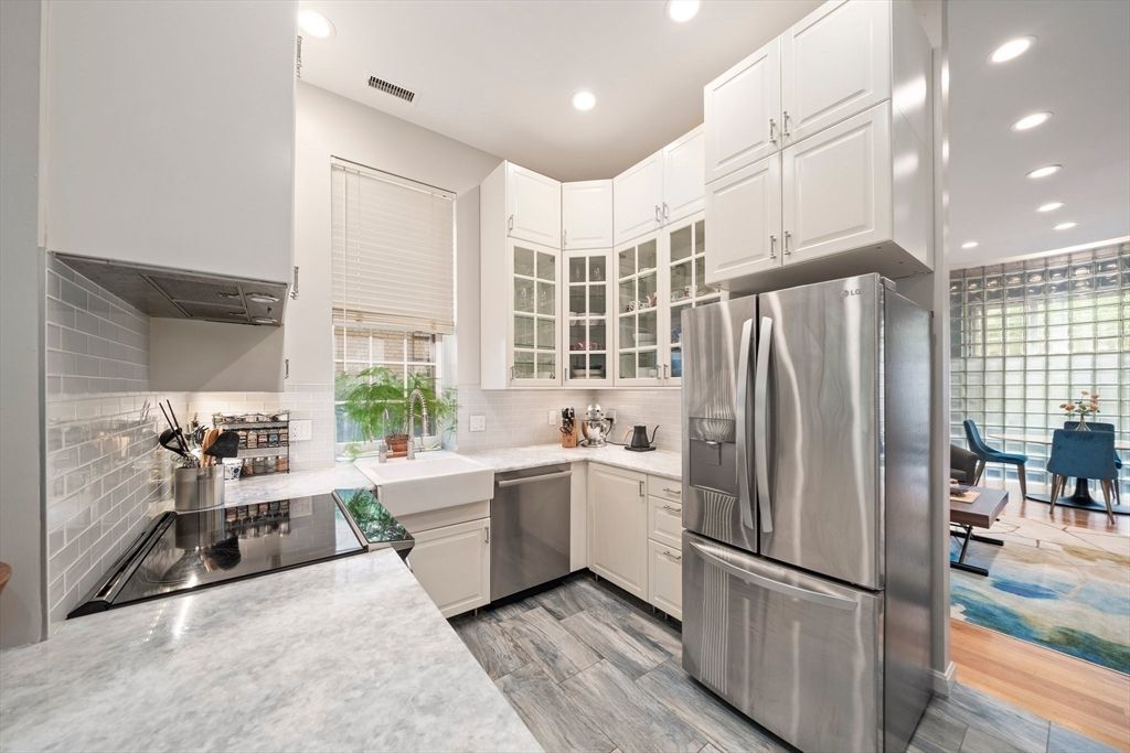 Dining room, Interior, Kitchen, Recessed Lighting, Stainless Steel Appliances, Wood Texture Flooring