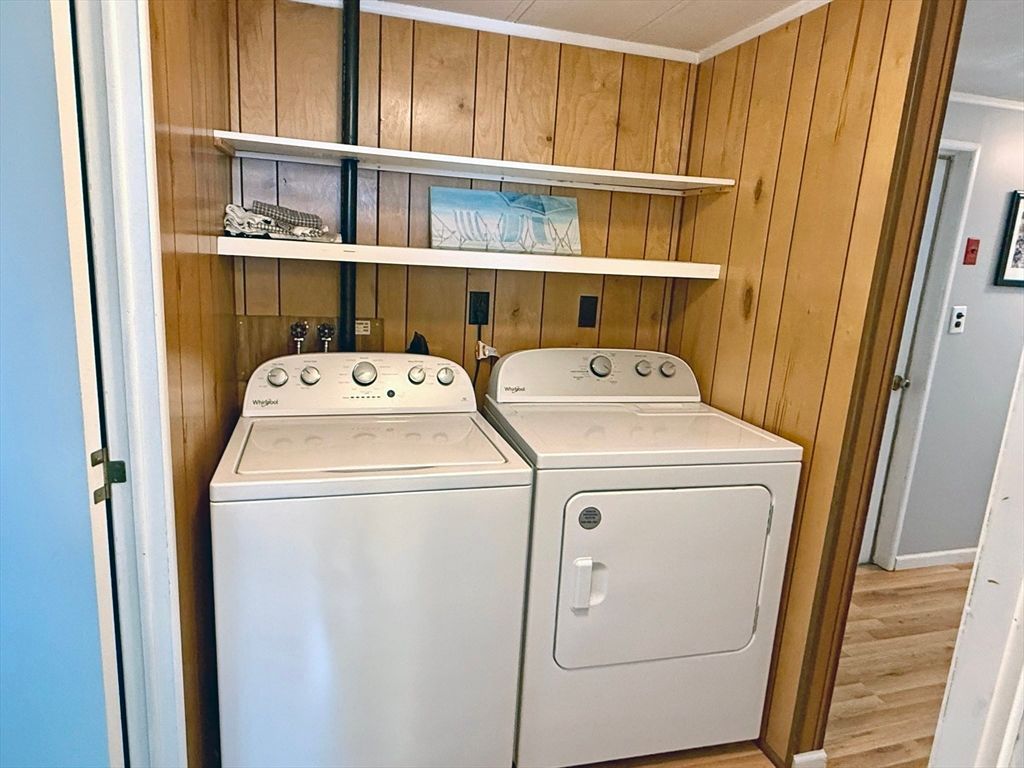 Interior, Utility Closets, Washer, Wood Texture Flooring, Wooden Walls