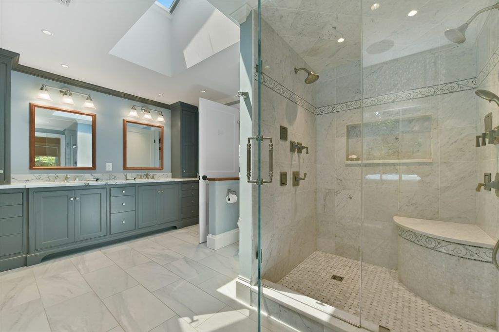 Bathroom, Dual Sink Vanities, Glass Shower, Interior, Marble Walls, Recessed Lighting