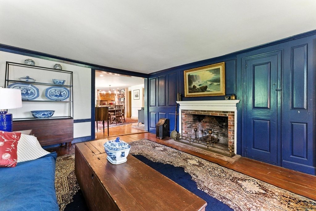 Chandelier, Dining room, Fireplace, Interior, Living room, Pendant Lights, Piano, Wood Texture Flooring