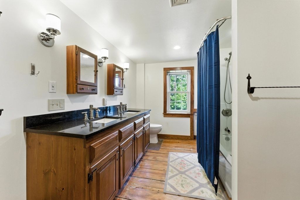 Bathroom, Dual Sink Vanities, Interior, Recessed Lighting, Wood Texture Flooring