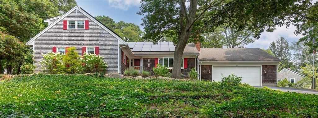 Attached, Exterior, Facade, Solar Panels, Tudor Revival