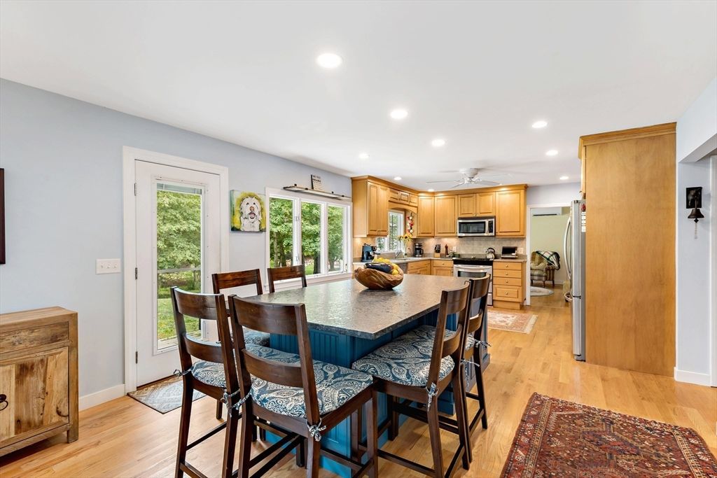 Dining room, Interior, Kitchen, Recessed Lighting, Stainless Steel Appliances, Wood Texture Flooring