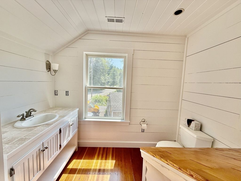 Bathroom, Dual Sink Vanities, Interior, Tile Countertops, Wood Texture Flooring